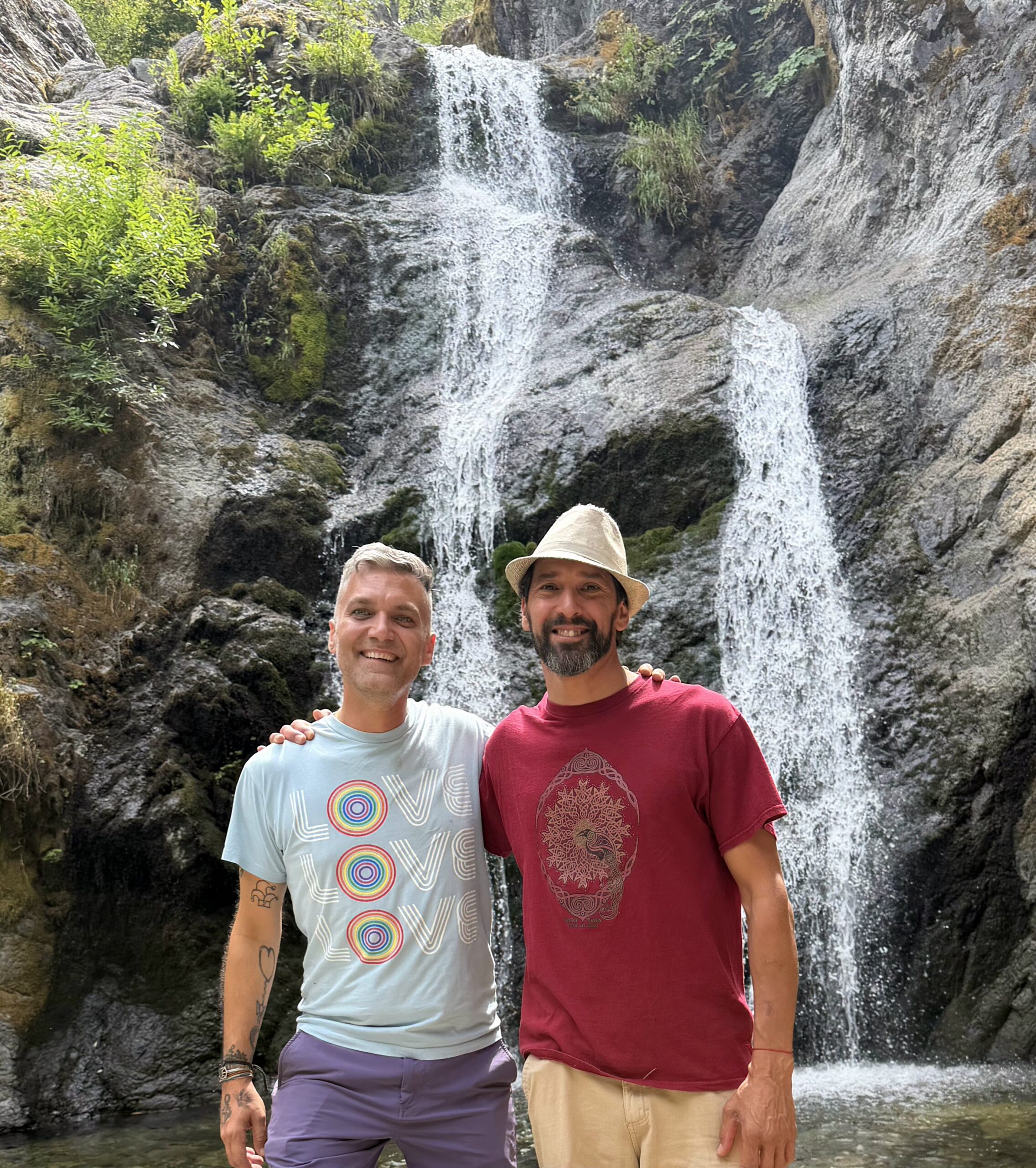 DamiEl Balderrama and JoJo at a waterfall during a guided vision quest on Mount Shasta